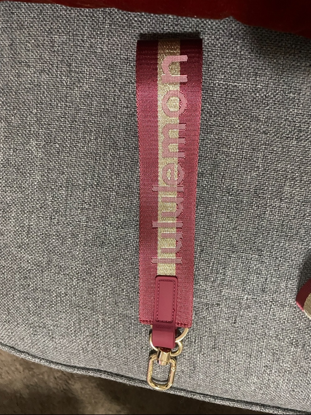 lululemon athletica Burgundy Strap Keychain with Gold Hardware